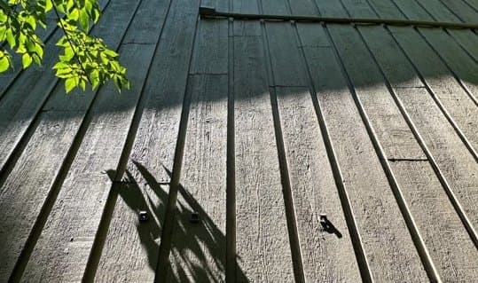 Close view of the same wood boards after finishing